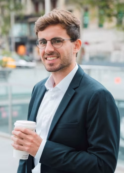smiling-young-businessman-holding-takeaway-coffee-cup-hand_23-2148176167 smiling-young-businessman-holding-takeaway-coffee-cup-hand_23-2148176167